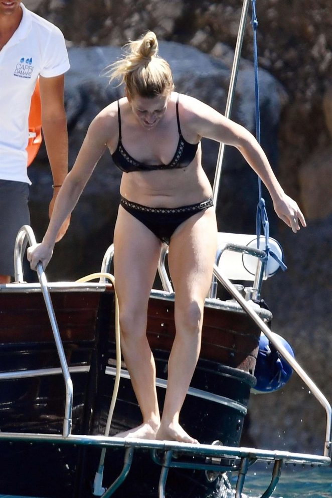 Ellie Goulding in Black Bikini at a Boat in Capri